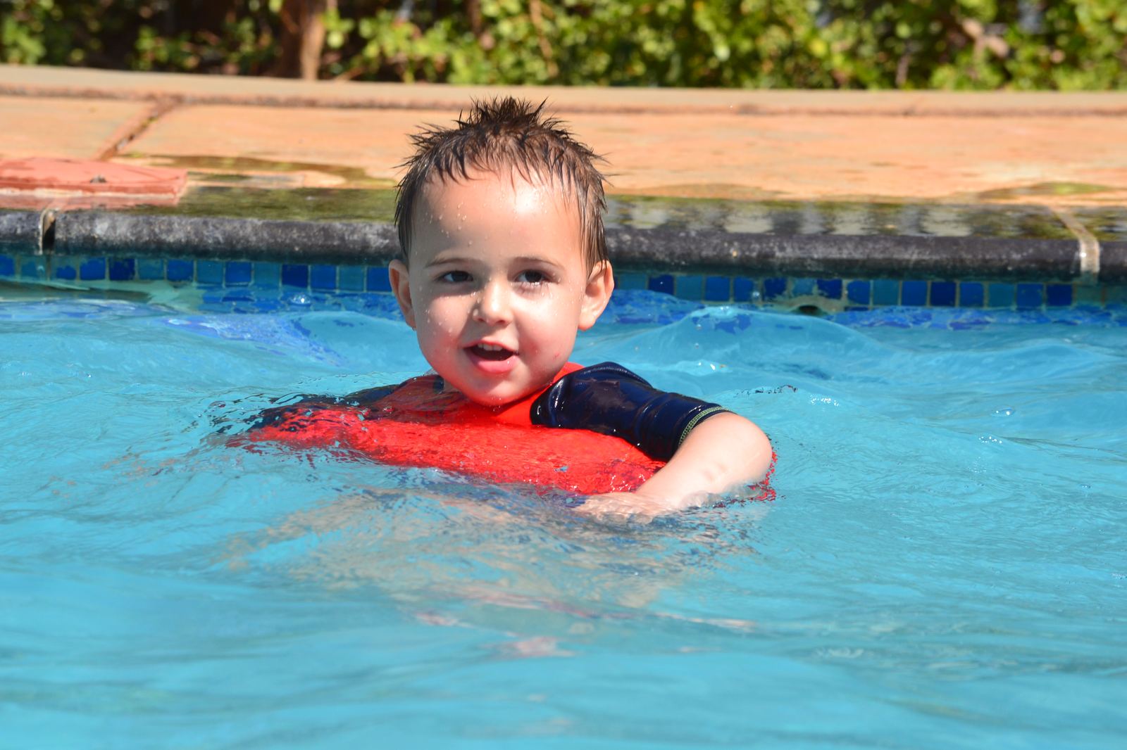 Boy swimming confidently with Water-Bugs